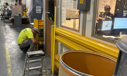 Painters at Work in Production Area