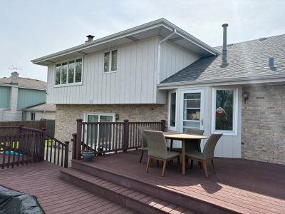 rear of house with attached deck