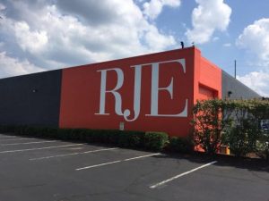 painting exterior with branded colors - commercial building in indianapolis