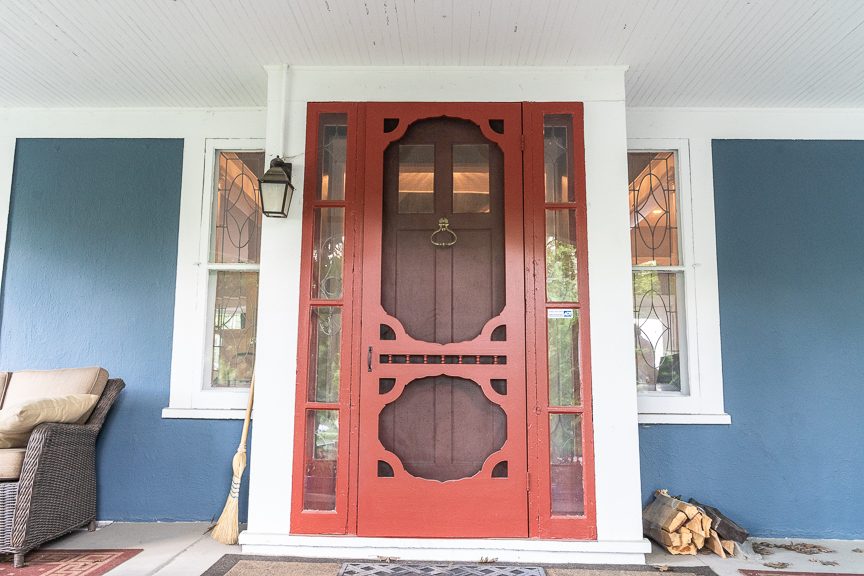salmon front door on blue house Preview Image 2