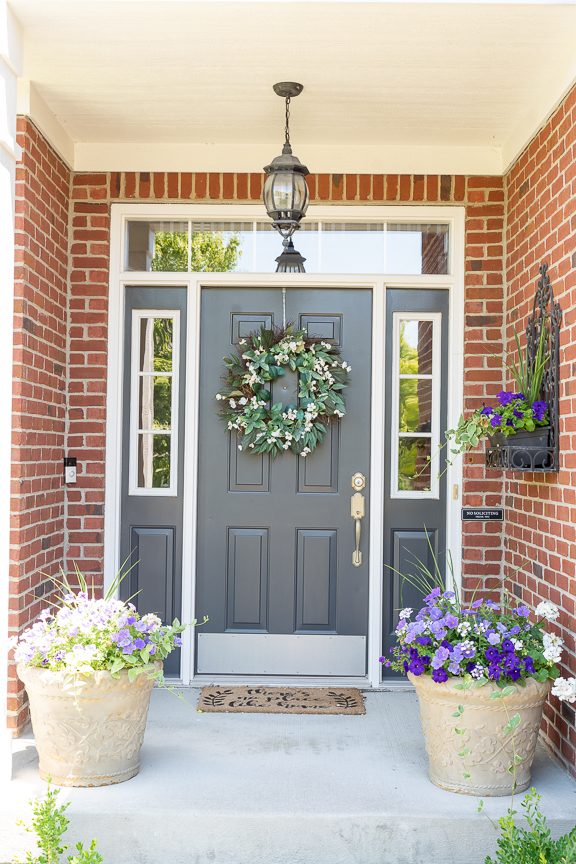 Gray painted front door on brick home Preview Image 1