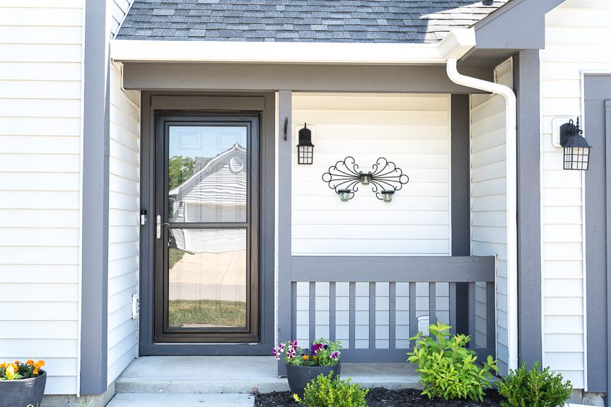 front entrance with white siding and gray trim Preview Image 1