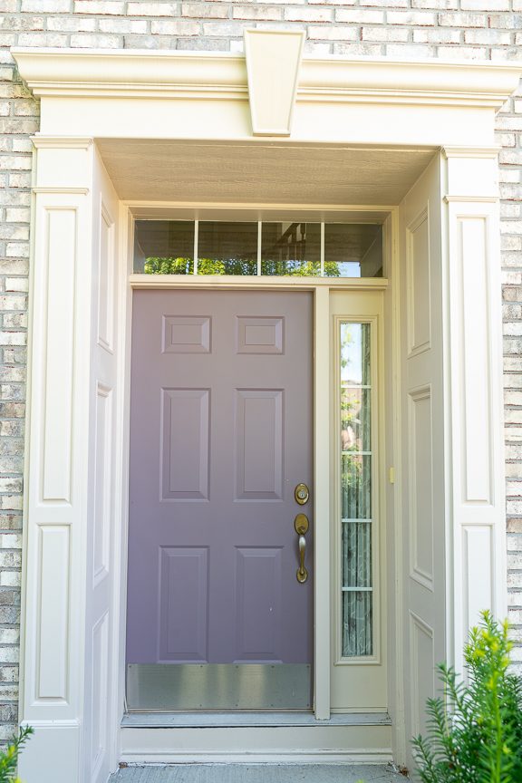painted front door on white brick home Preview Image 3