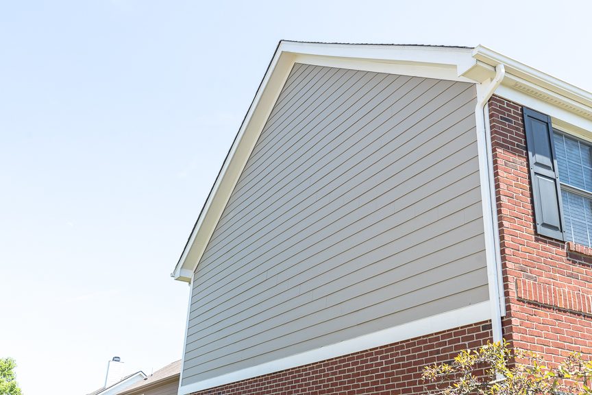 gray painted siding with white trim on brick house Preview Image 2