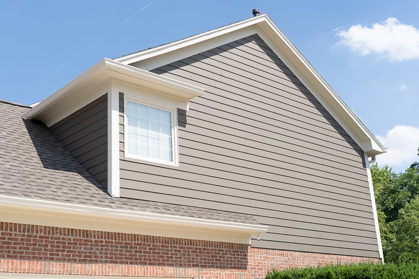 painted siding and trim on brick home Preview Image 2