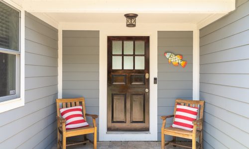 Stained Front Door with White Trim