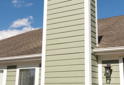 green painted chimney with white edges