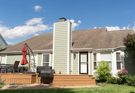 back of home and deck after painting project