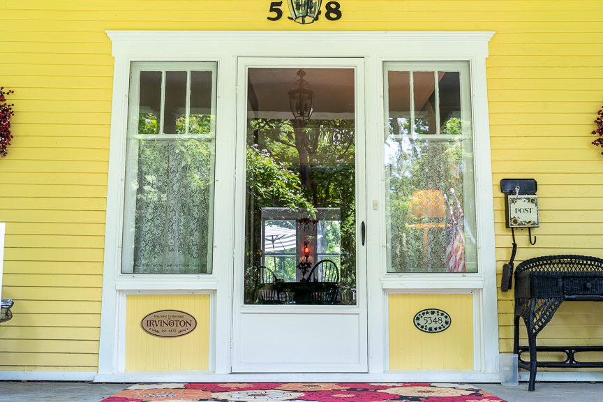 Historic home painted yellow and white Preview Image 3