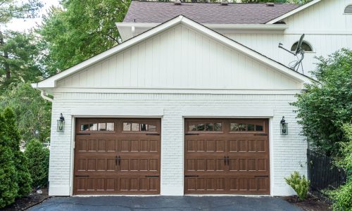 Stained Garage Doors with White Painted Brick