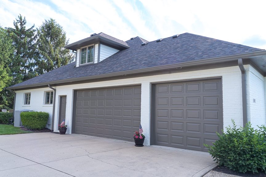 side of home with painted garage doors Preview Image 7