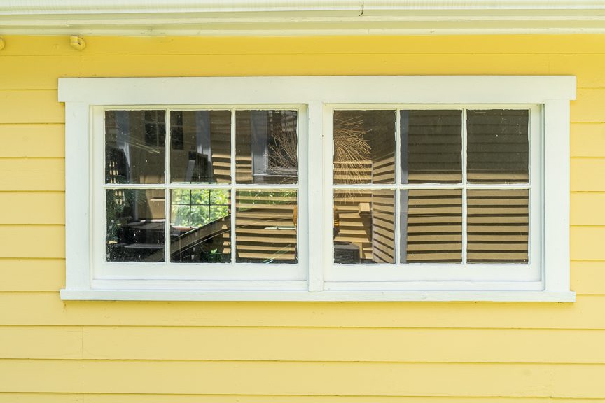 yellow and white painted house Preview Image 7