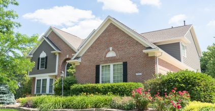 Brick Home with Painted Trim & Siding ...