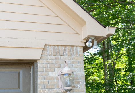 close up of siding and soffits after painting