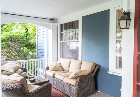 porch with blue and white wall