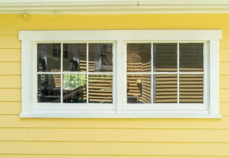 yellow and white painted house
