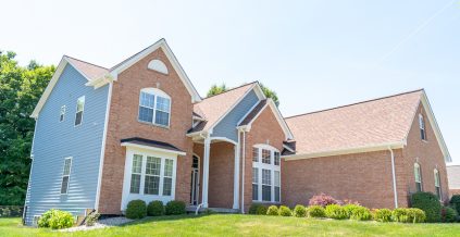 Brick Home With Siding & Trim