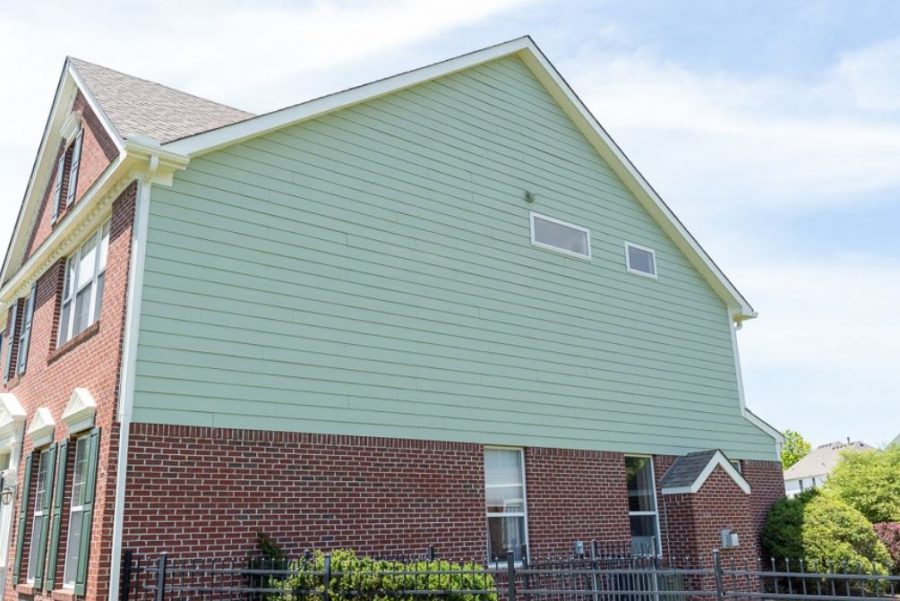 light green siding on home with white trim Preview Image 3