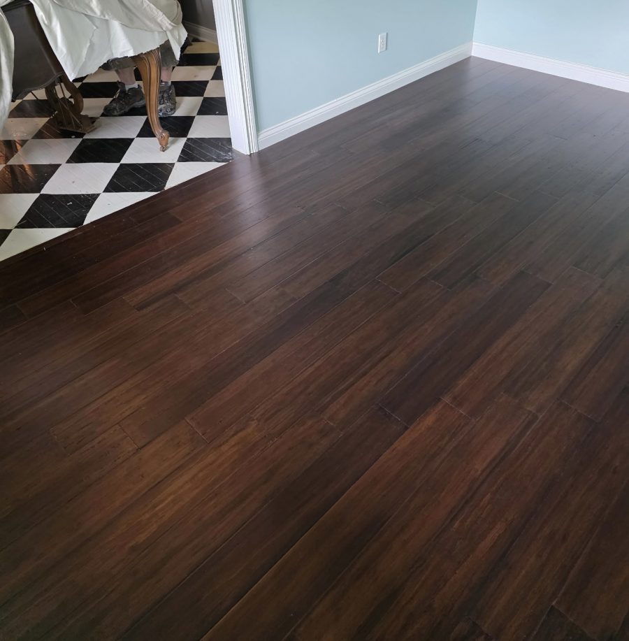 wooden flooring meeting with black and white checkered flooring Preview Image 4