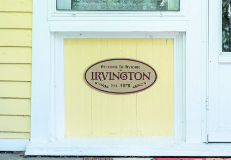 close up of sign on front of home