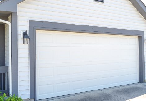 white garage door with black painted trim