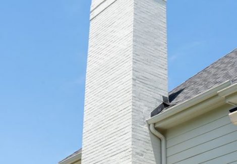 brick chimney painted white