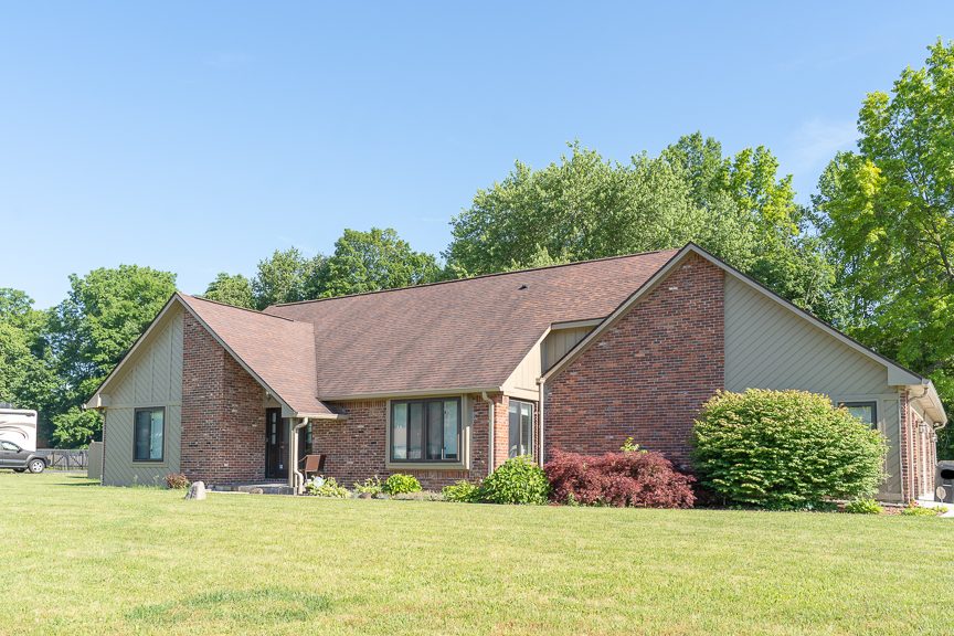 Painted wood siding on brick home Preview Image 1