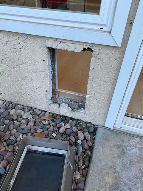 Dog Door / Stucco Patch Project Before