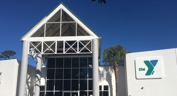 Front of building with new branding and colors.