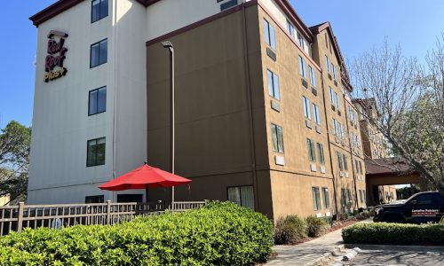 Side View of Hotel Before Painting