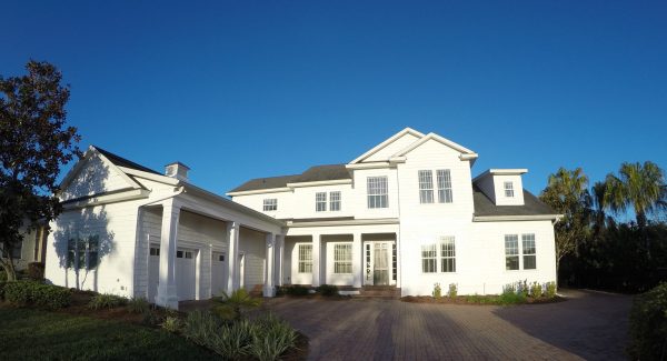 Freshly painted Ponte Verde Beach white house during sunset