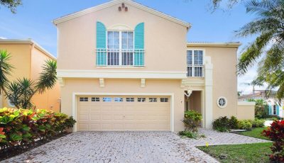 Exterior house painting by CertaPro Painters in Palm Beach Gardens, FL