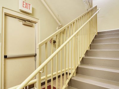 Walls, railings and stairs painted in this commercial stairwell by CertaPro Painters of Jupiter, FL