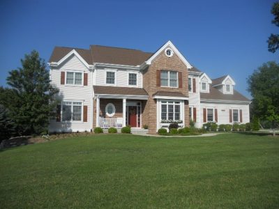 Exterior painting by CertaPro house painters in Texas Township