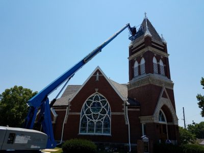 Church Steple being painted by CertaPro Painters of KC Northland, MO