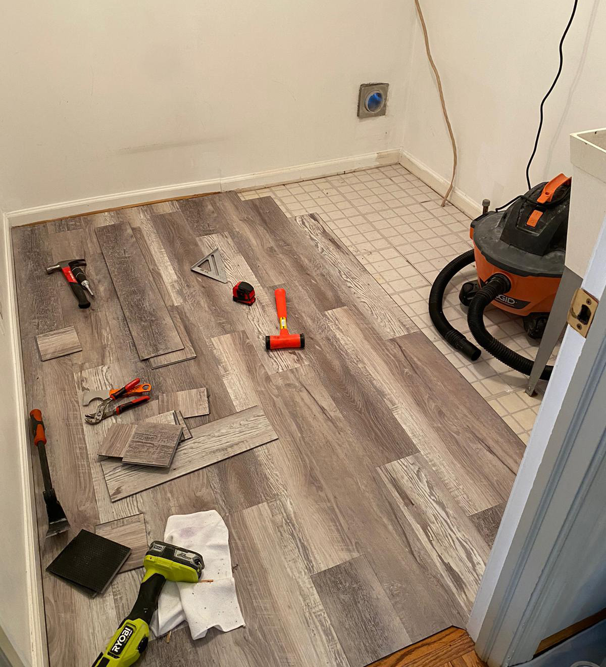 laundry room floor replacement before