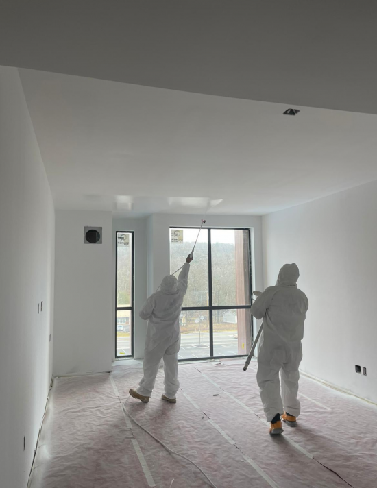 Hotel Painting Services painters spray painting interior room