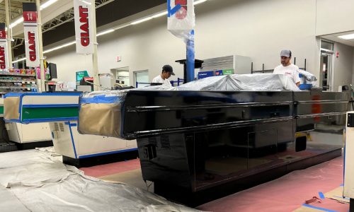 Staff Applying Paint