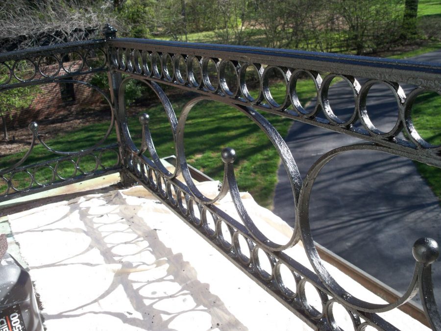 Wrought iron railing painting by CertaPro Painters of Kirkwood, MO