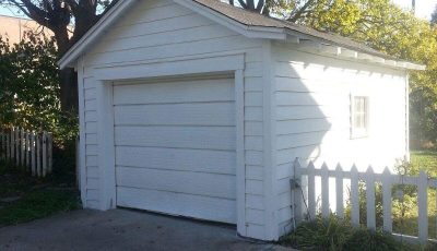 Exterior garage painting by CertaPro house painters in Kirkwood, MO