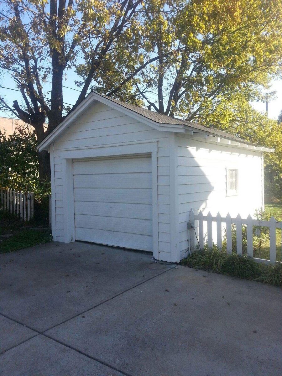 Exterior garage painting by CertaPro house painters in Kirkwood, MO