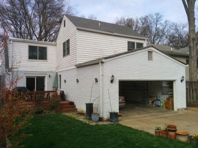 Exterior house painting by CertaPro painters in Clayton, MO