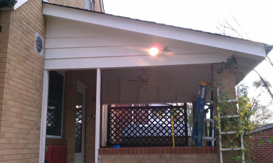 Exterior porch painting by CertaPro house painters in Brentwood, MO