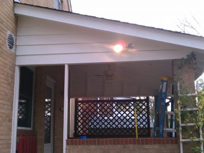 Exterior porch painting by CertaPro house painters in Brentwood, MO