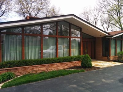 Exterior house painting by CertaPro painters in Frontenac, MO