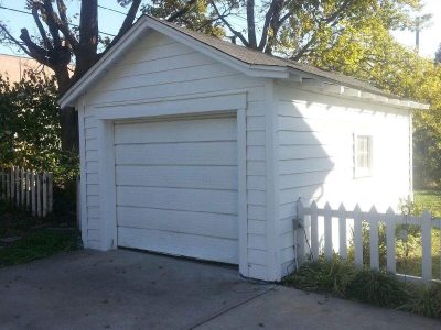 Exterior garage painting by CertaPro house painters in Kirkwood, MO