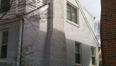 Exterior painting by CertaPro house painters in Clayton, MO