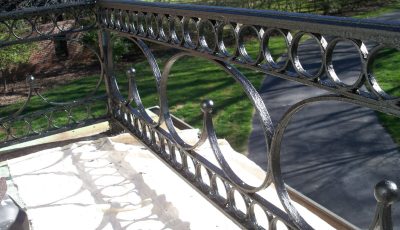 Wrought iron railing painting by CertaPro Painters of Kirkwood, MO