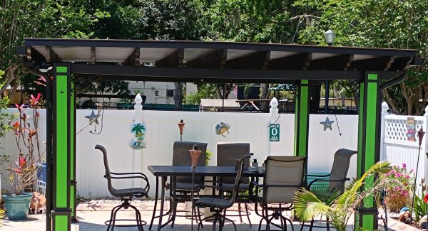 Green and black exterior painting for pergola Lakeland.