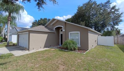 Exterior beige painting in Davenport, FL.